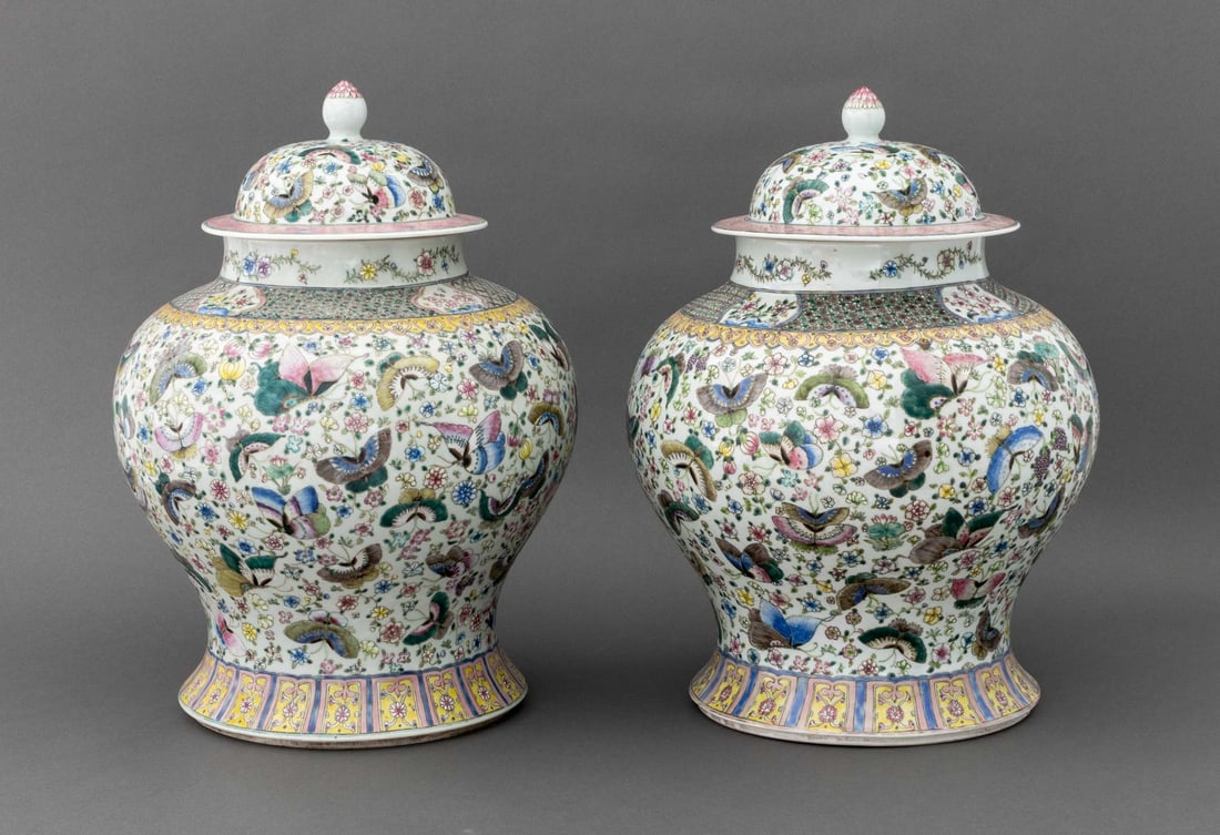 Chinese Famille Rose Porcelain Ginger Jars, Pair: Pair of Chinese Famille Rose Porcelain Covered Ginger Jars, each hand-painted with butterflies and flowers, blue underglaze double circle mark to underside. Each overall: 22" H x 14.5" Diameter. Prove