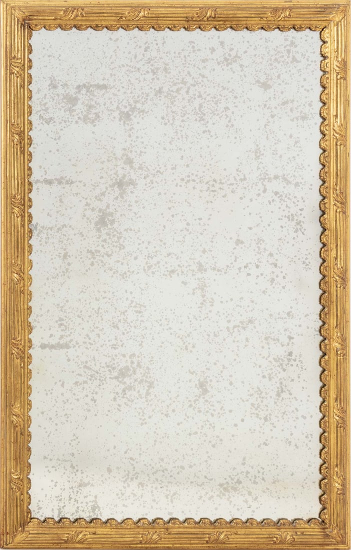 Louis XVI Style Water Gilded Rectangular Mirror: Louis XVI Style Water Gilded Rectangular Mirror, with acanthus leaf motif and scalloped interior edge surrounding antiqued glass. Mirror: 48" H x 28.5" W; frame: 53.5" H x 34.5" W x 2" D. Provenance:
