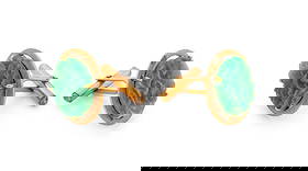 14K Yellow Gold Apple Green Jadeite Cufflinks: Pair of 14K Yellow Gold Floral Motif Carved Apple Green Jadeite Cufflinks, disks set in florentine engraved edge, marked: 14K. 1 1/4" x 7/8" approx.; depth: 8.0 mm approx.; Weight: 9.6 dwt. approx. Pr