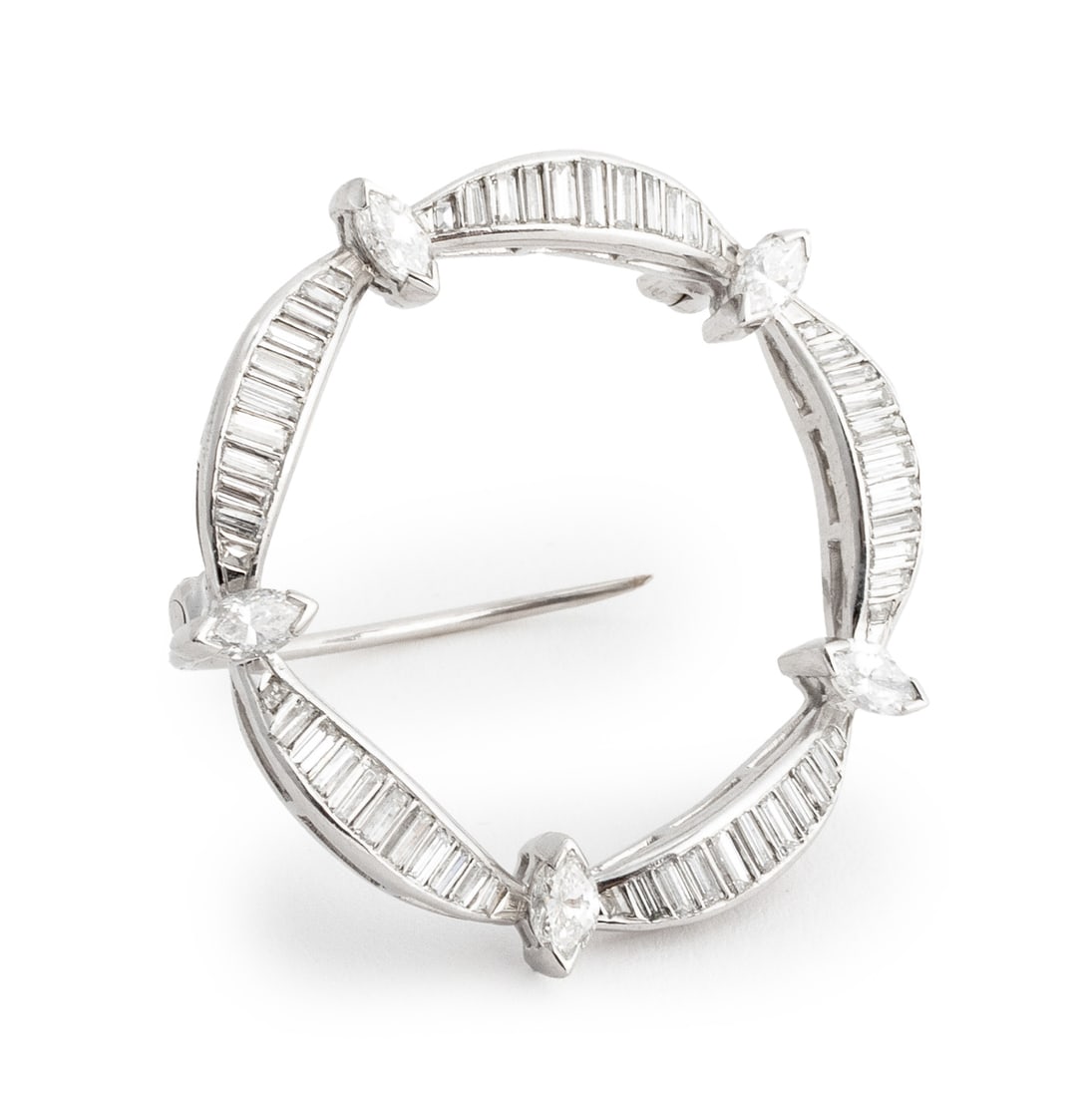 Platinum Diamond Circle Pin: Platinum Diamond Circle Pin, featuring fifty five channel set baguette diamonds and five prong set marquise brilliant cut diamonds weighing a total of approx. 2.50 carats, worn through fabric with cur