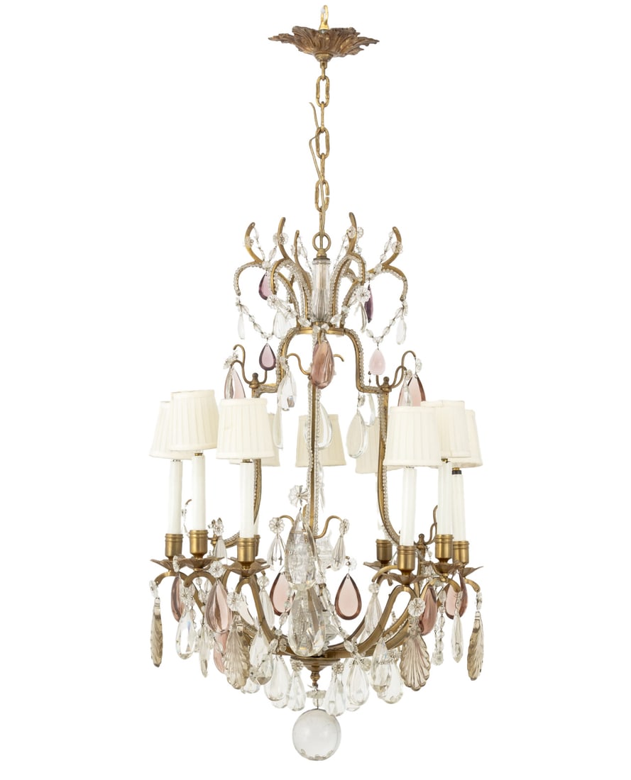 Continental Birdcage Bronze and Crystal Chandelier: Continental Birdcage Bronze and Crystal Chandelier, with nine scroll arm faux candlestick lights and multi-tier tear drop crystal accents. 40" H x 21" Diameter. Provenance: From an East 72nd Street
