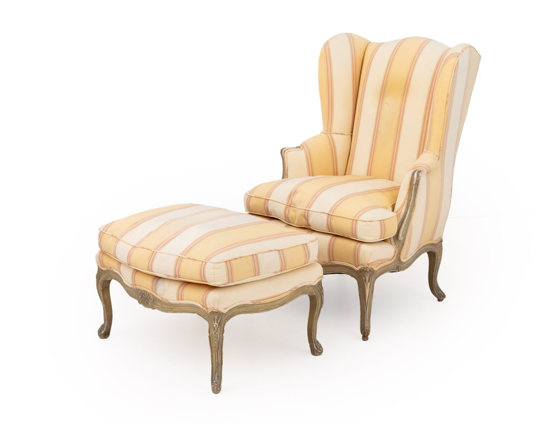 Louis XV Style Gray Painted Bergere and Stool: Louis XV Style Gray Painted Wing Back Bergere and Matching Stool, peach and cream striped upholstery, the stool with top cushion, both on fluted tapered legs. Chair: 41.5" H x 27" W x 24" D; 19.5" H.