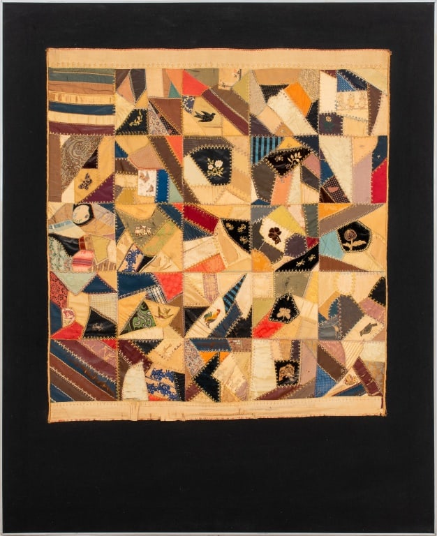 American Folk Art Crazy Quilt, ca. 1880: American Folk Art Crazy Quilt, circa 1880, silk patchwork pieces with chain and running stitches. Quilt: 57" H x 48" W; frame: 77" H x 62" W. Provenance: From a New York City Collection. Keywords: Ant