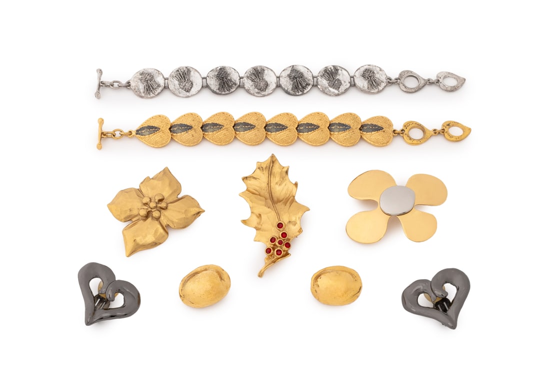 Yves Saint Laurent Jewelry, 7 Pcs.: Group of Seven Yves Saint Laurent Jewelry Pieces, most marked "YSL / Made in France" and comprising: three gold-tone metal brooches, two chain link bracelets, a pair of heart form earclips, and a pair