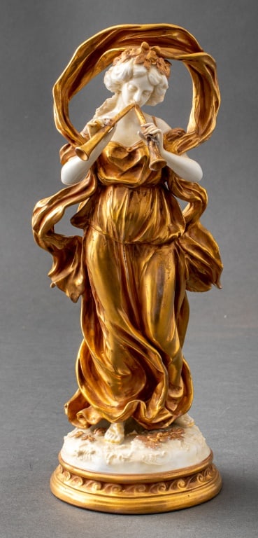 Capodimonte Gilded Porcelain Figure, ca. 1900: Capodimonte Neapolitan Gilded Porcelain Figure, circa 1900, with blue underglaze marks for Capodimonte, depicting a classically draped flute-playing maiden, perhaps Euterpe, in gilded glazed