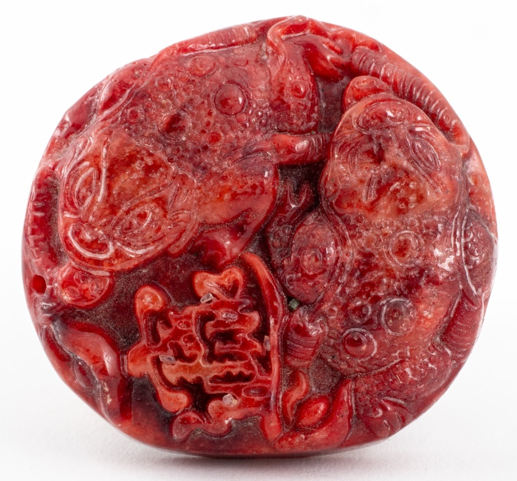Chinese Red Jade Two Frogs Plaque Pendant: Chinese Red Jade Carved Plaque Pendant of Two Frogs, coins carved in low relief to reverse. 2.25" L x 2" W x 0.75" D. Provenance: From a New York City Collection. Keywords: Chinese Art, Asian Art,
