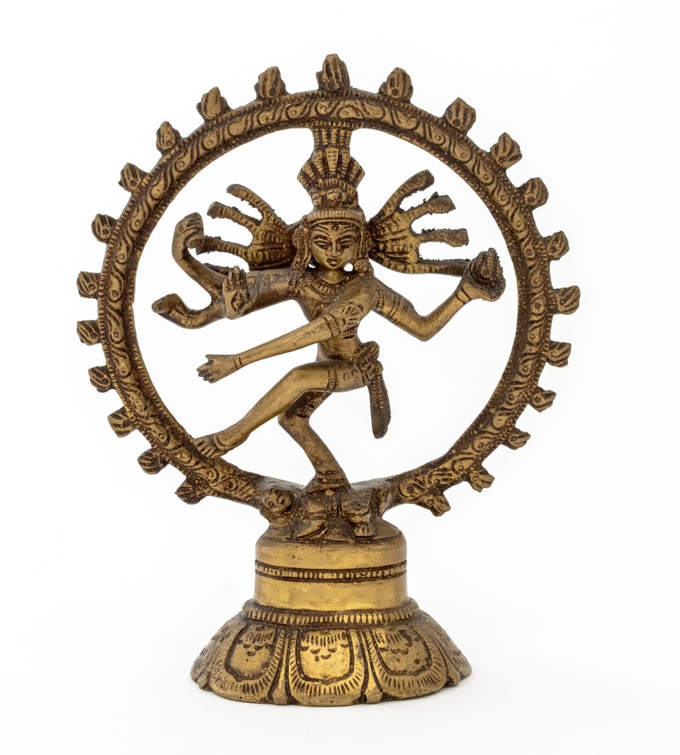 Indian Shiva Nataraja Bronze Sculpture: Indian Shiva Nataraja Bronze Sculpture, the Hindu god performing the Tandava surrounded by a ring of flames on a lotus form base, unmarked. 5.75" H x 4.5" Diameter. Provenance: Property from a Bunny