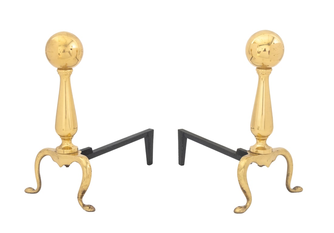 Brass Cannonball Andirons, 19th C., Pair: Pair of Brass Cannonball Andirons, late 19th century. 14" H x 8" W x 12" D. Provenance: From the Estate of American Fashion Journalist and Editor-in-Chief of Vogue (1971-1988) Grace Mirabella Cahan. K