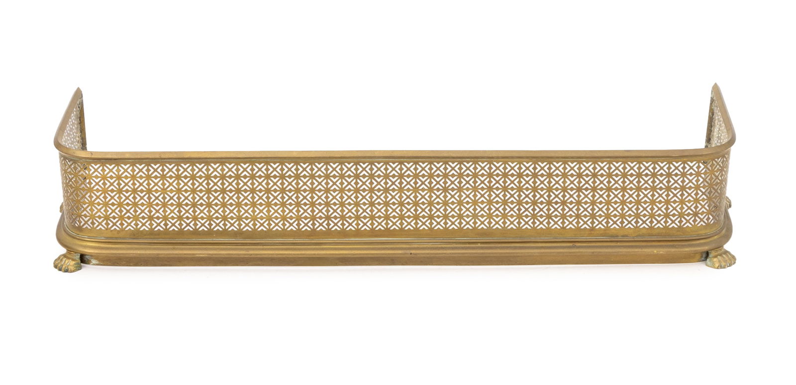 Victorian Pierced Brass Fire Fender, 19th C.: Victorian Pierced Brass Fire Fender, late 19th century, on four paw feet. 9" H x 47" W x 13.5" D. Provenance: From the Estate of American Fashion Journalist and Editor-in-Chief of Vogue (1971-1988) Gr