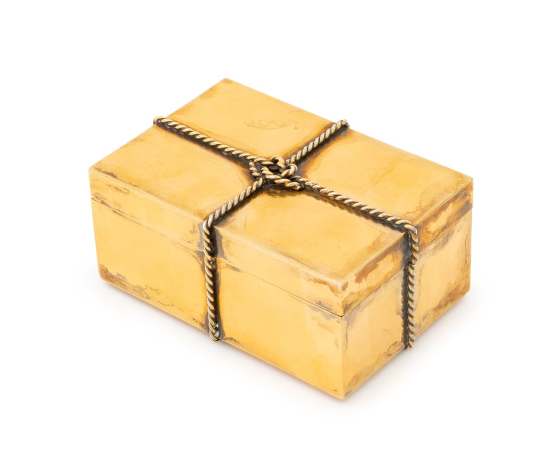 Tiffany & Co. Vermeil Sterling Keepsake Box: Tiffany and Company Vermeil Sterling Silver Keepsake Box, fabricated in sterling silver with gold overlay, designed as two piece box with detachable lid, decorated with twisted wire parcel tie design,