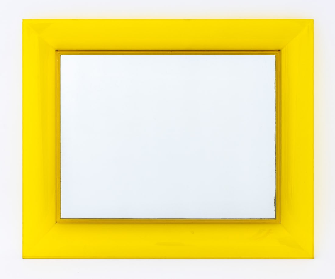 Starck x Kartell "Francois Ghost" Acrylic Mirror: Philippe Starck for Kartell "Francois Ghost" Yellow Acrylic Wall Mirror, marked "Francois Ghost / Kartell / with Starck" ro reverse. Mirror plate: 23.25" H x 17.75" W; overall: 31" H x 25.5" W x 2" D.