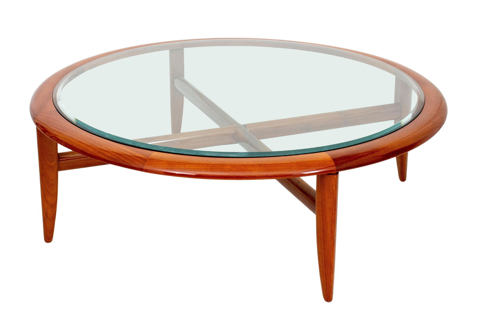 Adam Tihany x Pace Glass Top Mahogany Coffee Table: Adam Tihany for Pace Collection Beveled Glass Top Mahogany Coffee Table, Venezia Series, circa 1980, the circular top above four legs conjoined by X-form stretcher. 17.5" H x 51" Diameter.