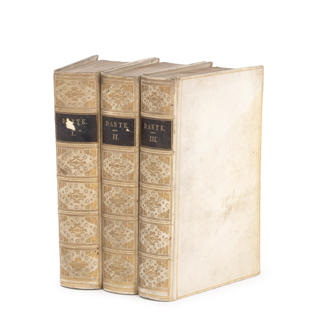 Dante Alighieri "La Divina Commedia", 1829: Alighieri, Dante, "La Divina Commedia" [The Divine Comedy], Milan: Giovanni Silvestri, 1829, Second Edition, 3 volume set, vellum over boards binding. Each: 6.25" L x 4" W x 1.25" D. Provenance: From