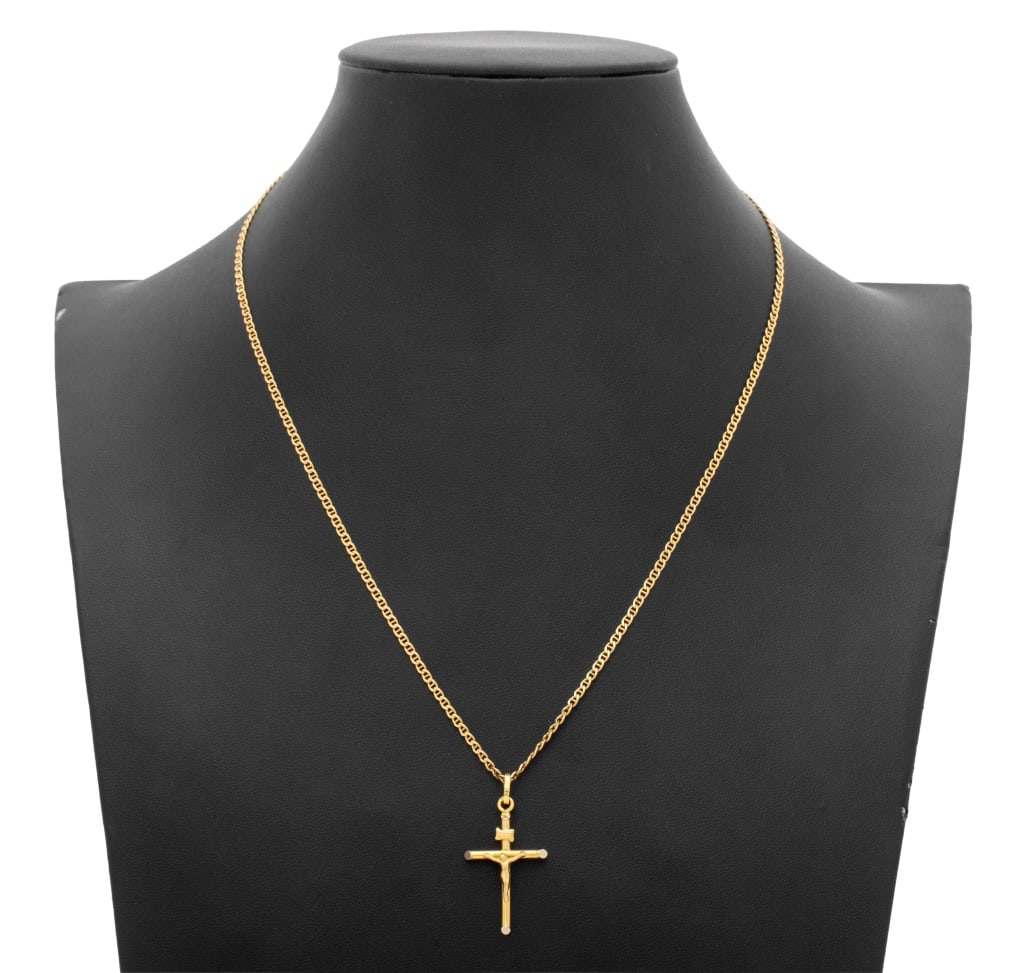 18K Yellow Gold Crucifix Pendant Necklace: 18K Yellow Gold Crucifix Pendant Necklace, detachable from chain, joined with hook and eye clasp, marked: "750 with Italian assay marks". Measuring approx. 20" x 1 1/2" across widest point, 3.8 dwt.