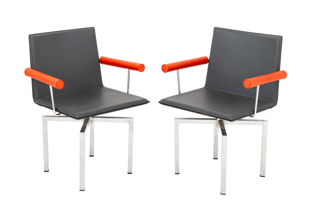 Il Loft "HI.02" Hils Leather Swivel Armchairs, Pr.: Pair of Il Loft "HI.02" Hils Leather Swivel Arm Chairs, each with grey leather seat and back and orange leather arms, with "Il Loft" label to the underside. 30.75" H x 23" W x 19" D; seat: 17.5" H.