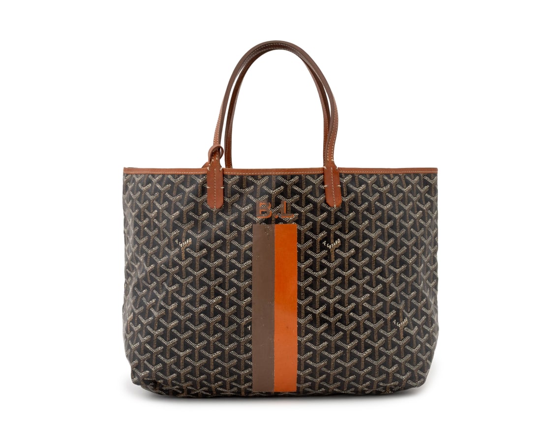 Goyard Black Goyardine Canvas Tote Bag: Goyard Black Goyardine Coated Canvas Tote Bag, with brown and orange stripes and "B.L." monogram, marked "E. Goyard Honore Paris" in print. To top handle: 17" H x 18" W x 5.25" D. Provenance: From an