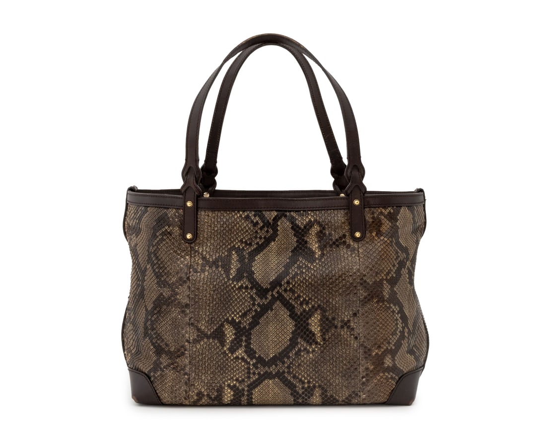 Gucci Snakeskin and Leather Tote Bag: Gucci Snakeskin and Brown Leather Tote Bag, with brown suede lining, marked "Gucci / Made in Italy" below inside zipper pocket. To top handle: 20" H x 18" W x 5.75" D. Provenance: From an Upper East S