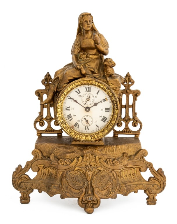 Ansonia Gilt Metal Figural Mantel Clock, 19th C.: Ansonia Gilt Metal Figural Mantel Clock, 19th century, with seated maiden and sheep finial on pierced scroll and crest form base. 13.5" H x 11.25" W x 4.5" D. Provenance: From a Park Avenue Estate. Ke