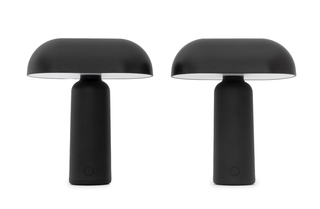 Normann Copenhagen "Porta" Black Table Lamps, Pair: Pair of Normann Copenhagen "Porta" Black Table Lamps, labels to undersides. 9.5" H x 7.75" W x 4.5" D. Provenance: From an East 53rd Street Collection. Keywords: Lighting, Designer, Danish Modern, Den