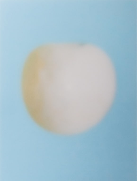 Contemporary School Blurred Fruit C-Print: Contemporary School, Blurred Fruit, Chromogenic Print in Colors on Acrylic Panel, sky blue ground with pale central image of fruit, apparently unsigned, unframed. 40" H x 29.75" W. Provenance: From a