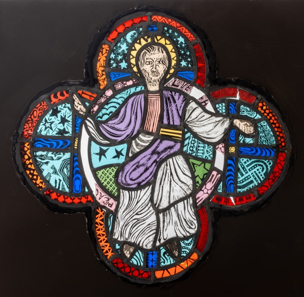 Ecclesiastical Stained Glass Window, 19th C.: Ecclesiastical Quatrefoil Stained Glass Window Panel, 19th century, depicting Christ in blessing gesture, mounted between mat board. Image: 16" H x 16.5" W; mat: 20" H x 26.5" W. Provenance: From an U