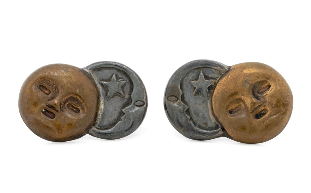 William Spratling Sun Moon Silver Copper Earclips: Pair of William Spratling Sun Moon Motif Silver Copper Clip Earrings, featuring sterling silver moon faces and copper sun faces, worn on earlobes with threaded screwbacks, marked: "SPRATLING SILVER".