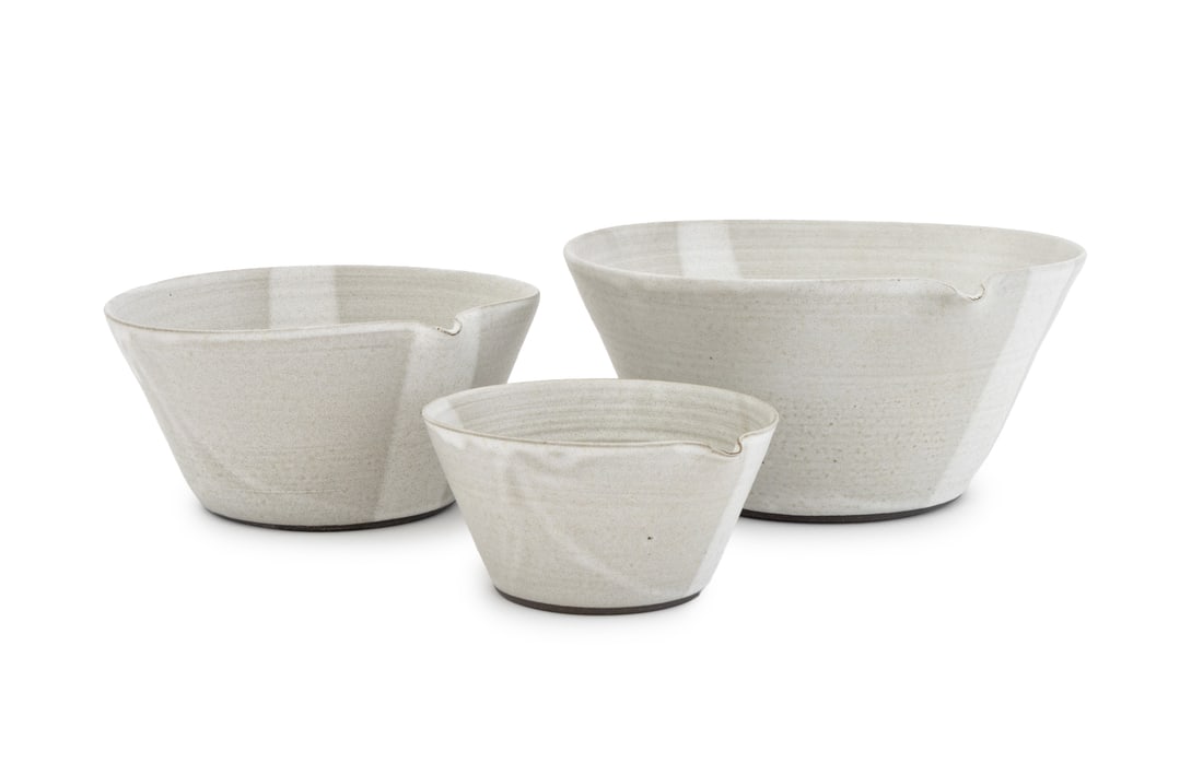 Studio Art Pottery Graduated Spouted Bowl Set, 3: Set of Three Studio Art Pottery Spouted Graduated Bowls, with impressed "EB" and double heart marks to undersides, the largest additionally marked "NYC / 2018". Largest: 5.25" H x 11.5" W x 11" D.