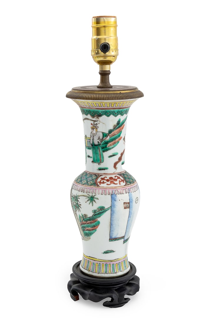 Chinese Famille Verte Vase Mounted as a Lamp: Chinese Famille Verte Porcelain Vase Mounted as a Table Lamp, atop an ebonized wood stand. 15" H x 4.5" Diameter. Provenance: From a Palm Beach Collection. Keywords: Asian Art, China, Ceramics,