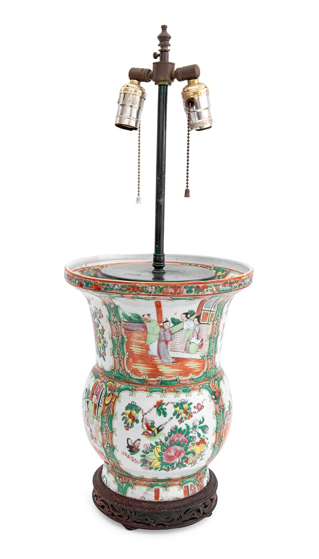 Chinese Famille Rose Porcelain Vase Mounted Lamp: Chinese Famille Rose Porcelain Vase Mounted as a Lamp, with two light fixtures, decorated with alternating scenes of birds and flowers and figural scenes in palace courtyards, on a carved wood base.