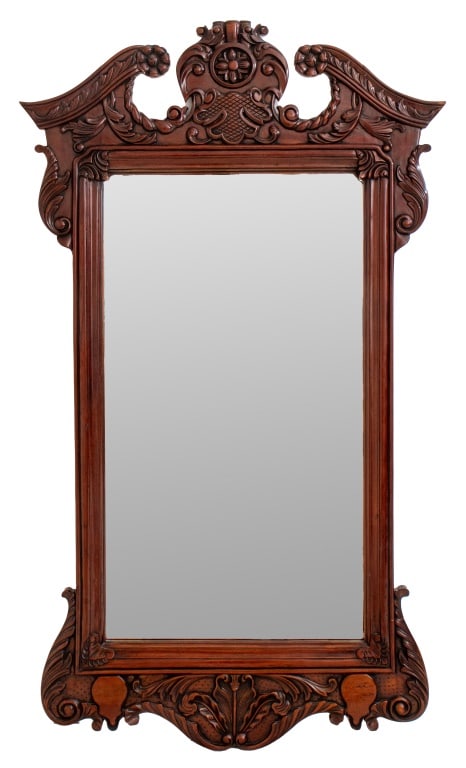George II Style Mahogany Mirror: George II Style Mahogany Mirror, with beveled glass mirror plate and acanthus leaf relief carvings. 54.75" H x 32" W. Provenance: From a Ft. Lee Collection. Keywords: Vanity, Looking glass, Wall hangi