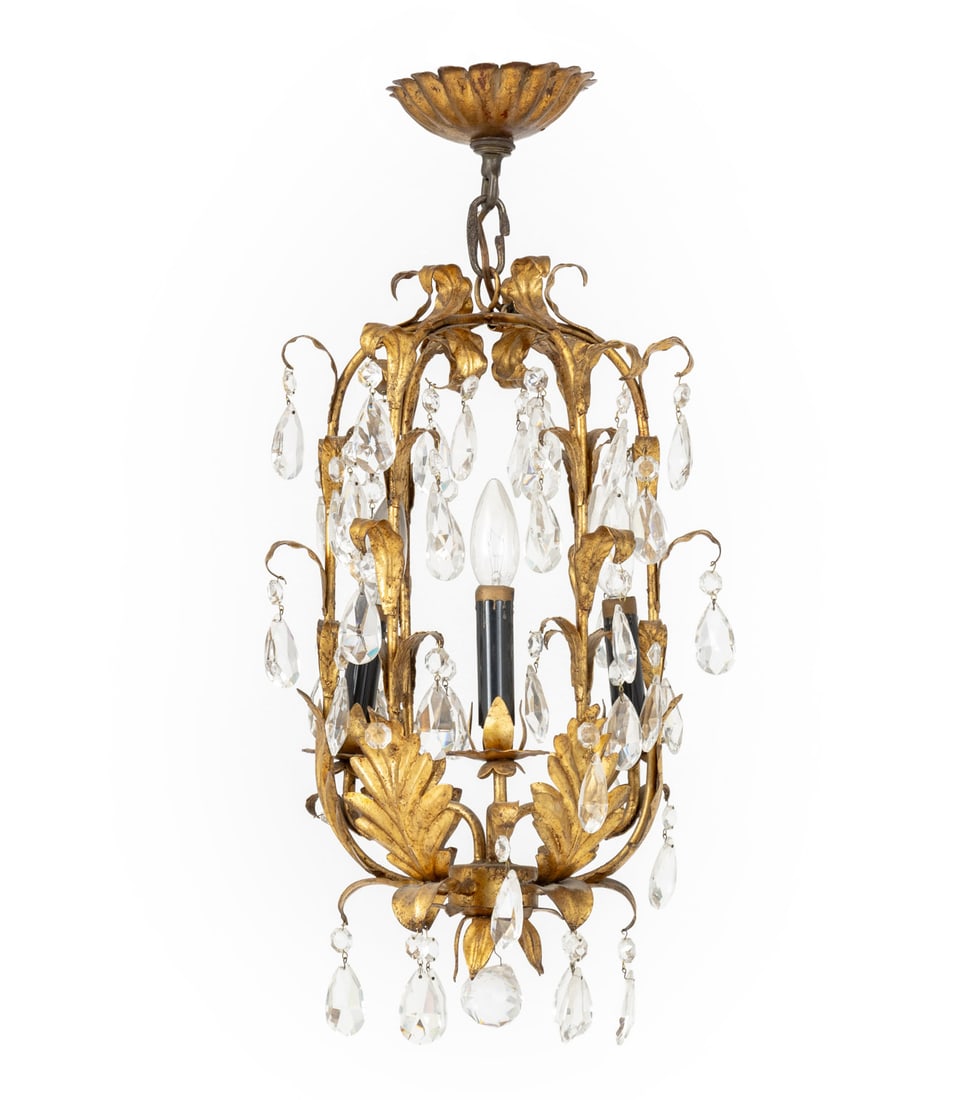 Italian Diminutive Gilt Chandelier: Italian Diminutive Gilt Chandelier, gilt tole foliage elements and crystal droplets. 23" H x 8" Diameter. Provenance: From a New York City Collection. Keywords: Lighting, Ceiling Lamp, Pendant light,