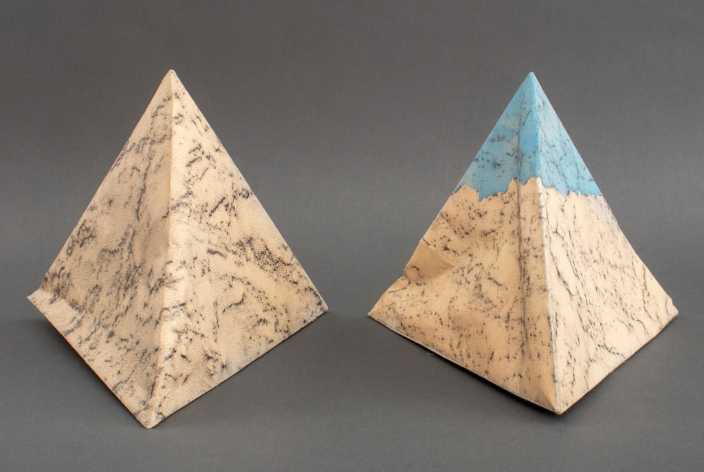 Elfi Schuselka Pyramid Paper Sculptures, 2: Elfi Schuselka (Austrian, b. 1940) Two Pyramid Painted and Charcoal Paper Sculptures, apparently unsigned. 9.25" H x 11" W x 9.75" D. Provenance: From the Collection of the artist. Note: Schuselka