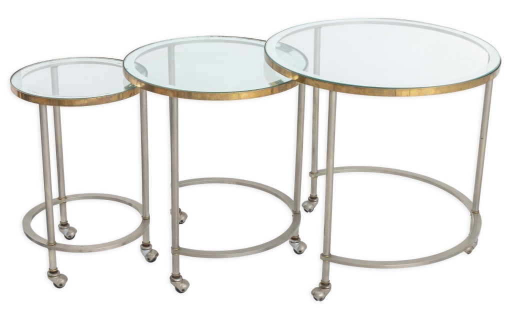 Mid-Century Modern Chrome Nesting Tables, 3: Set of Three Mid-Century Modern Glass Top Chrome Nesting Tables, all on casters. 22.25" H x 22.5" Diameter. Provenance: Property from a West Palm Beach Estate. Keywords: Vintage Furniture, Side table,
