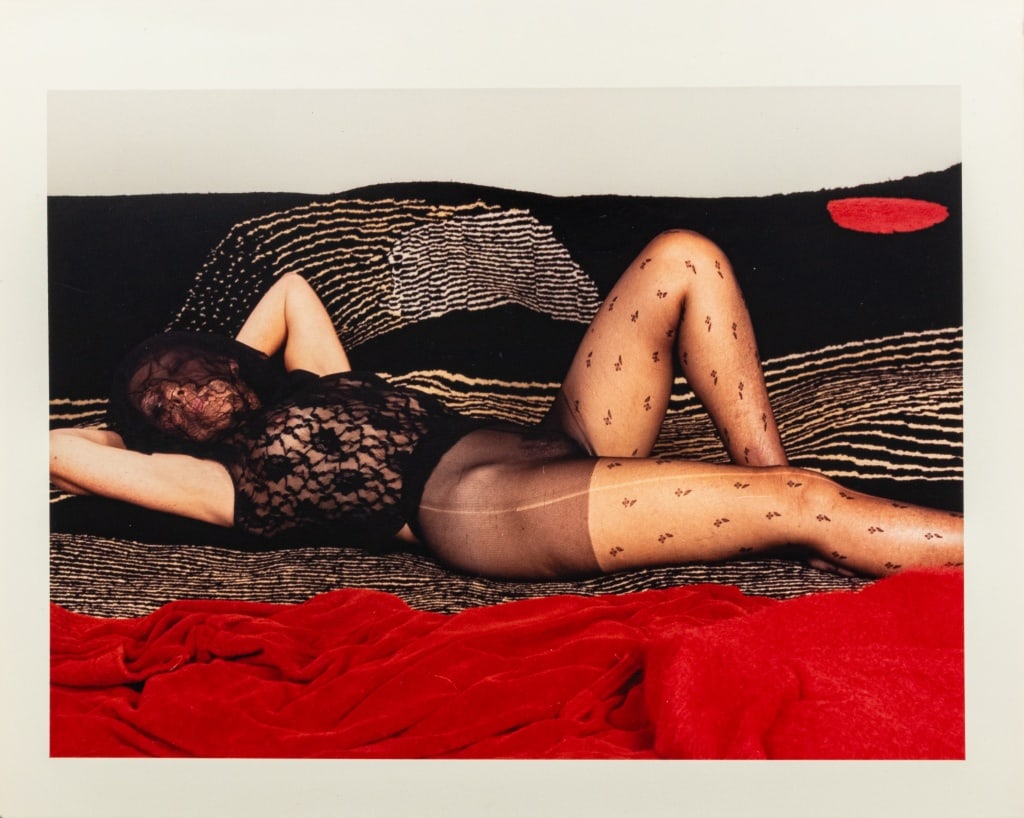 Anne Sager "Women Over 50" Chromogenic Print: Anne Sager (American, 1930-2024), Reclining Female Figure, Chromogenic Print in Colors, from the "Women Over 50" series, woman in lace lingerie reclining on patterned blankets, stamped "Anne Sager