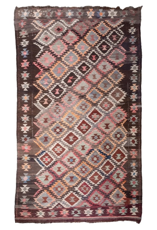 Turkish Kilim Woven Rug, 9' 1" x 5' 4": Turkish Kilim Woven Wool Rug, with diamond geometric pattern and geometric border. 9' 1" L x 5' 4" W. Provenance: From a New York City Collection. Keywords: Rugs, Carpet, Floor covering, Textile,