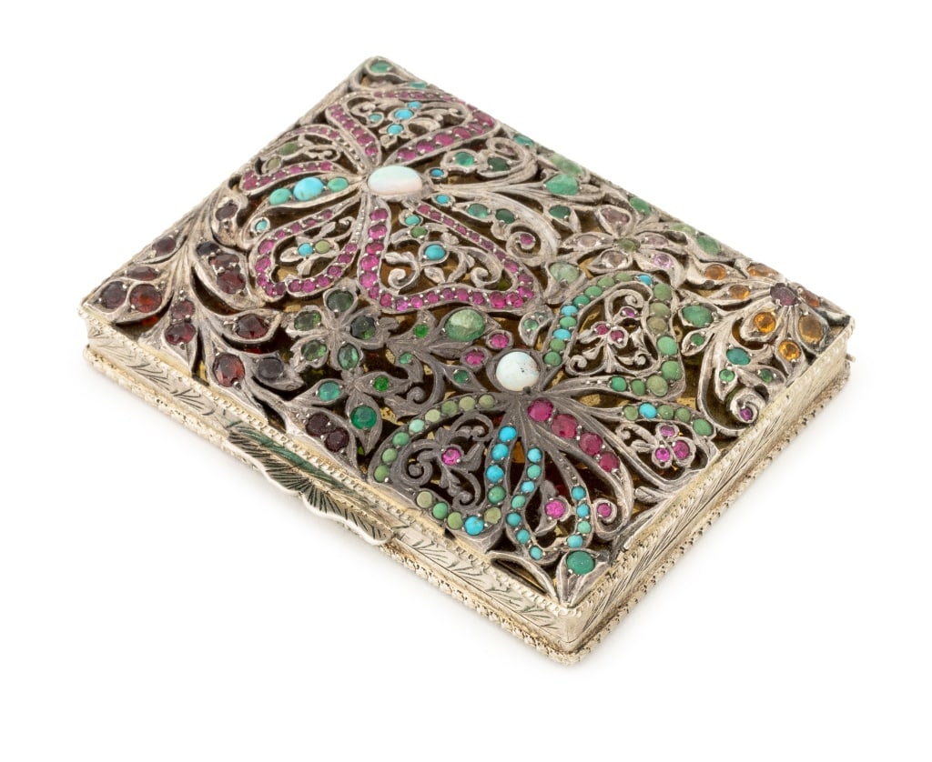 Floral Motif Silver Multicolored Gemstone Compact: Floral and Butterfly Motif 800 Silver Multicolored Gemstone Powder Compact, featuring hand fabricated silver hinged compact decorated with bead set rubies, emeralds, sapphires, quartz, garnets, turquo