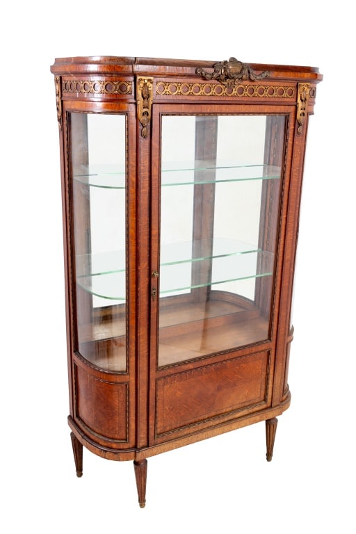 Louis XVI Style Gilt Metal Mounted Oak Vitrine: Louis XVI Style Gilt Metal Mounted Oak Vitrine, 20th century, the glazed door enclosing three shelves, with "By Royal Appointment / London / Paris / Buenos Aires / Maple & Co." plaque label. 67" H x