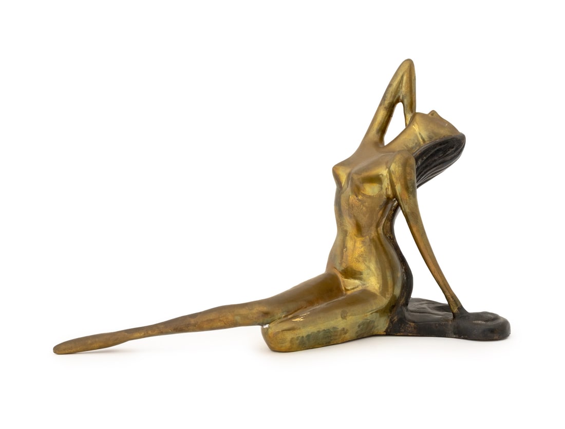 Art Deco Reclining Camelia Gilt Bronze Sculpture: Art Deco Reclining Camelia Gilt Bronze Sculpture, the nude figure with dark brown patina to the long hair, unsigned. 11" H x 17.25" W x 9" D. Provenance: From a New York City Collection. Keywords: Bro