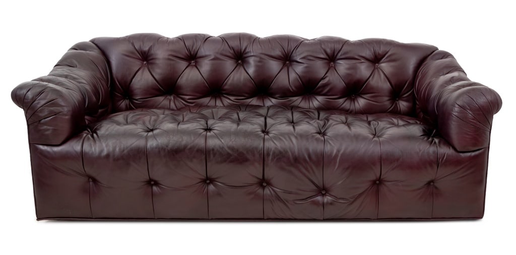Chesterfield Burgundy Leather Button-Tufted Sofa: Chesterfield Burgundy Leather Button Down Two-Seat Sofa. 33" H x 81" W x 40" D; seat: 17.5" H. Provenance: From a Park Avenue Collection. Keywords: Vintage Furniture, Seating, Couch, Loveseat, Upholst
