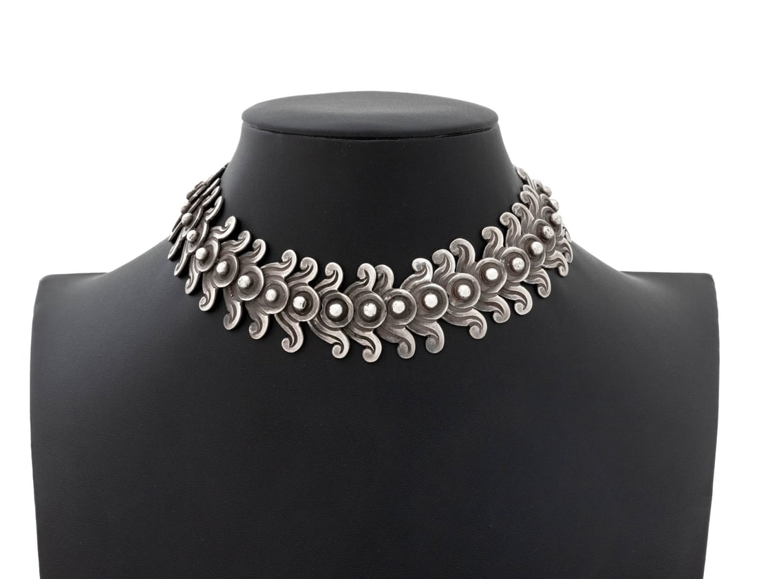 Los Castillo Taxco Silver Choker Collar Necklace: Los Castillo Taxco Silver Choker Collar Necklace, designed as hinged centipede collar necklace, joined with hook and eye clasp, marked: "980 LOS CASTILLO TAXCO". Measuring approx. 13 1/2" x 1 1/8",