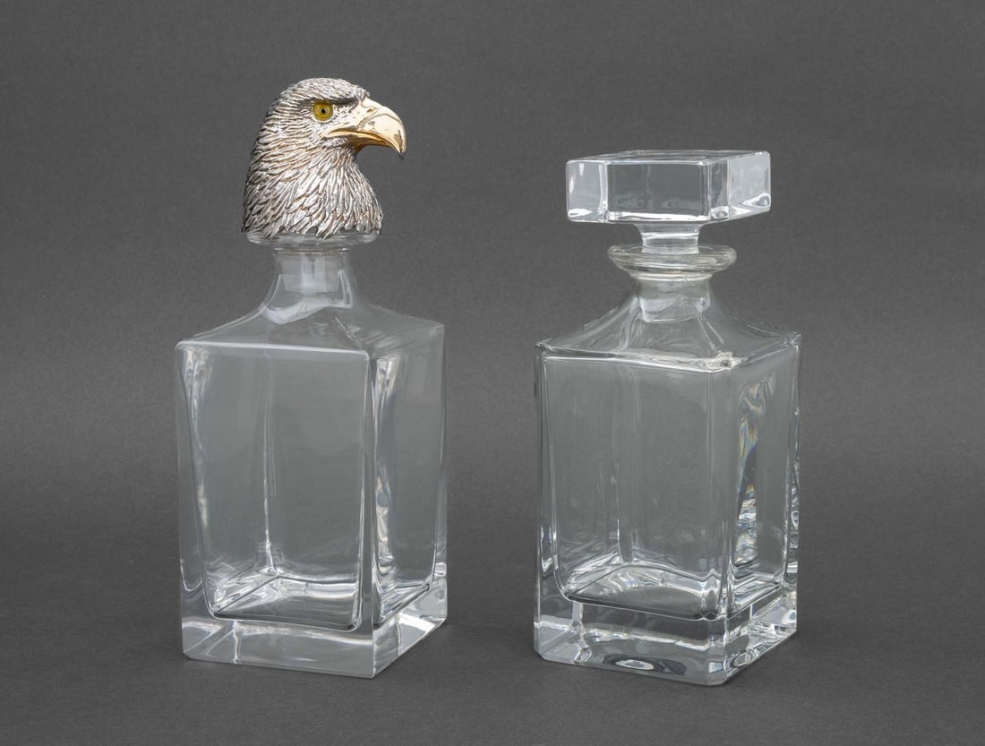 Deakin & Francis Crystal Decanters, 2: Two Deakin and Francis Crystal Decanters, comprising: rectangular with square stopper, marked "Dartington Crystal for Deakin and Francis / England" to underside, and rectangular body with silver plate