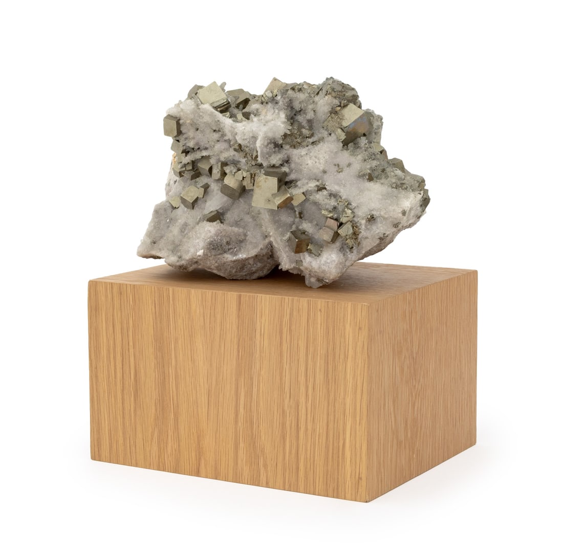 Pyrite on Clear Quartz Crystal Cluster Specimen: Pyrite on Clear Quartz Crystal Cluster Specimen, on an oak wood pedestal stand. Overall: 14.75" x 12.5" W x 11.5" D. Provenance: From an East 53rd Street Collection. Keywords: Rock crystal, Mineral sp