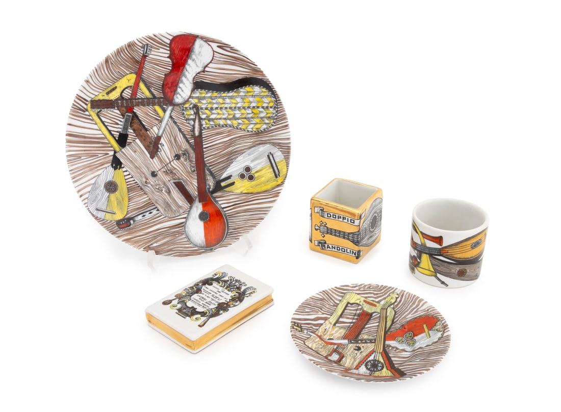 Fornasetti Musical Porcelain Tableware, 5 Pcs.: Collection of Five Fornasetti Musical Instrument Motif Porcelain Tableware Pieces, comprising: (2) "Instrumenti Musicali" plate and small dish, marked "Fornasetti Milano / Made in Italy", one cup, mar