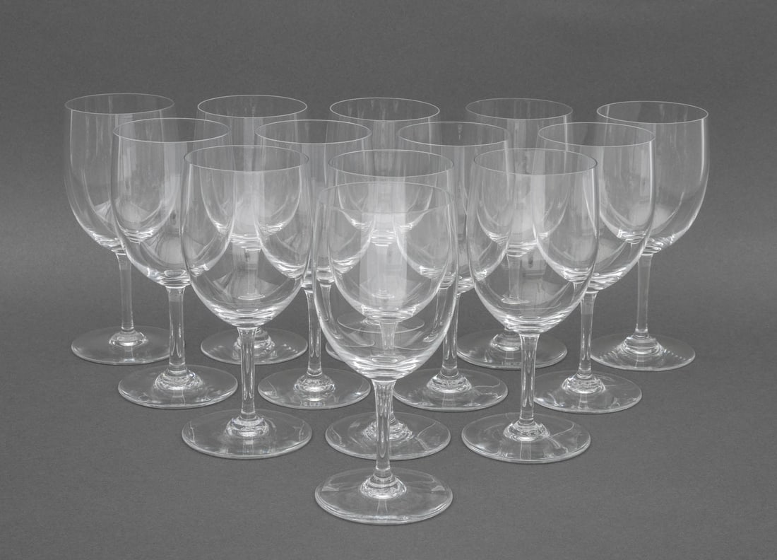 Baccarat Crystal "Perfection" Wine Glasses, 13: Set of 13 Baccarat "Perfection" Pattern Crystal Wine Glasses, each with acid-etched mark to underside. 7.25" H x 3.25" Diameter. Provenance: From a New York City Collection. Keywords: Oenology, French