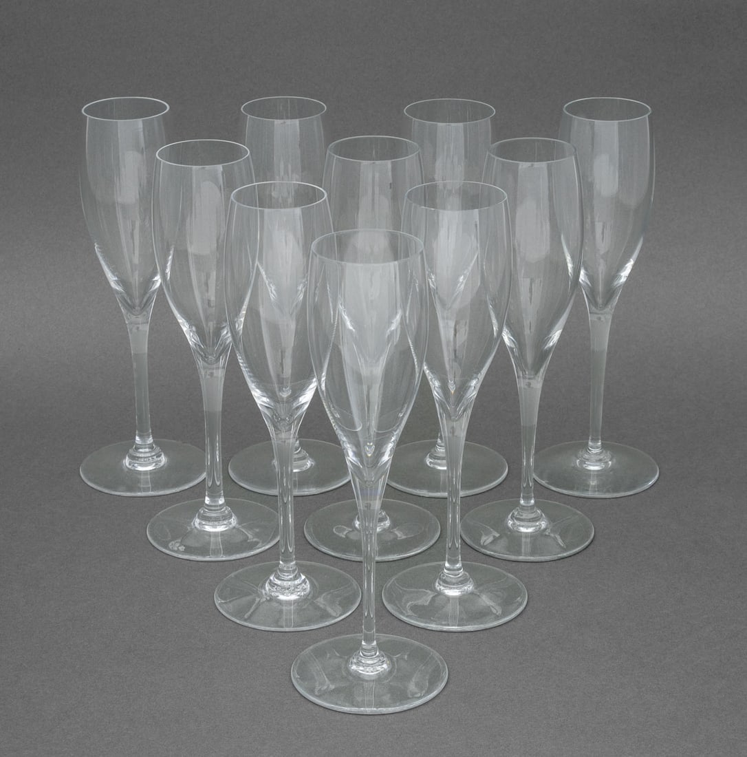 Baccarat Crystal "St. Remy" Champagne Flutes, 10: Set of 10 Baccarat Crystal "St. Remy" Pattern Champagne Flutes, each with acid-etched mark to underside. 8.5" H x 3" Diameter. Provenance: From a New York City Collection. Keywords: French cristal, De