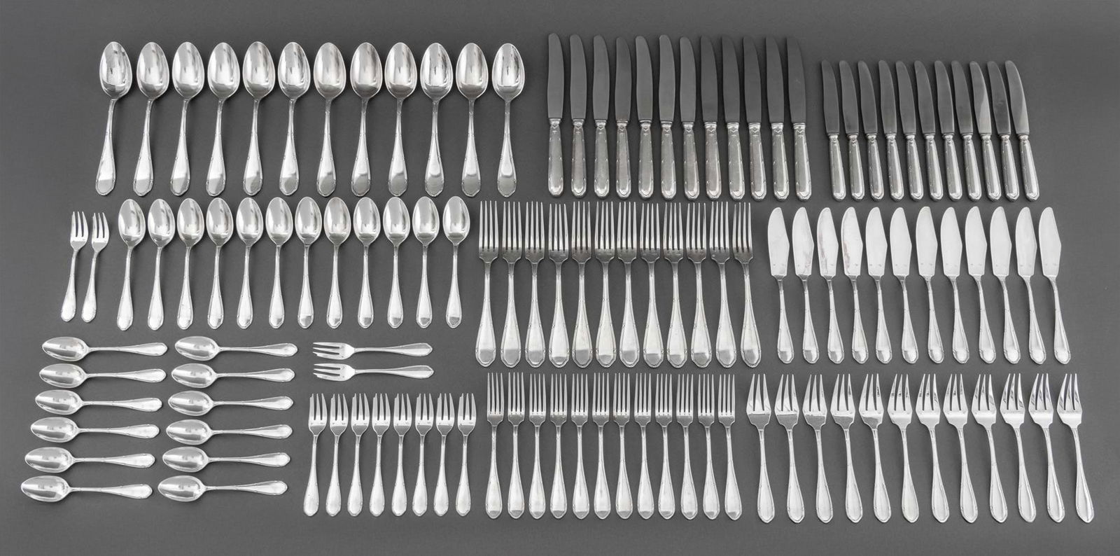 French Argental Silver Plate Flatware, 120 Pcs.: Set of French Argental Silver Plate Flatware Pieces, comprising: (13) thirteen dinner knives, (12) twelve dinner forks, (12) twelve place spoons, (11) eleven luncheon knives, (12) twelve salad forks,