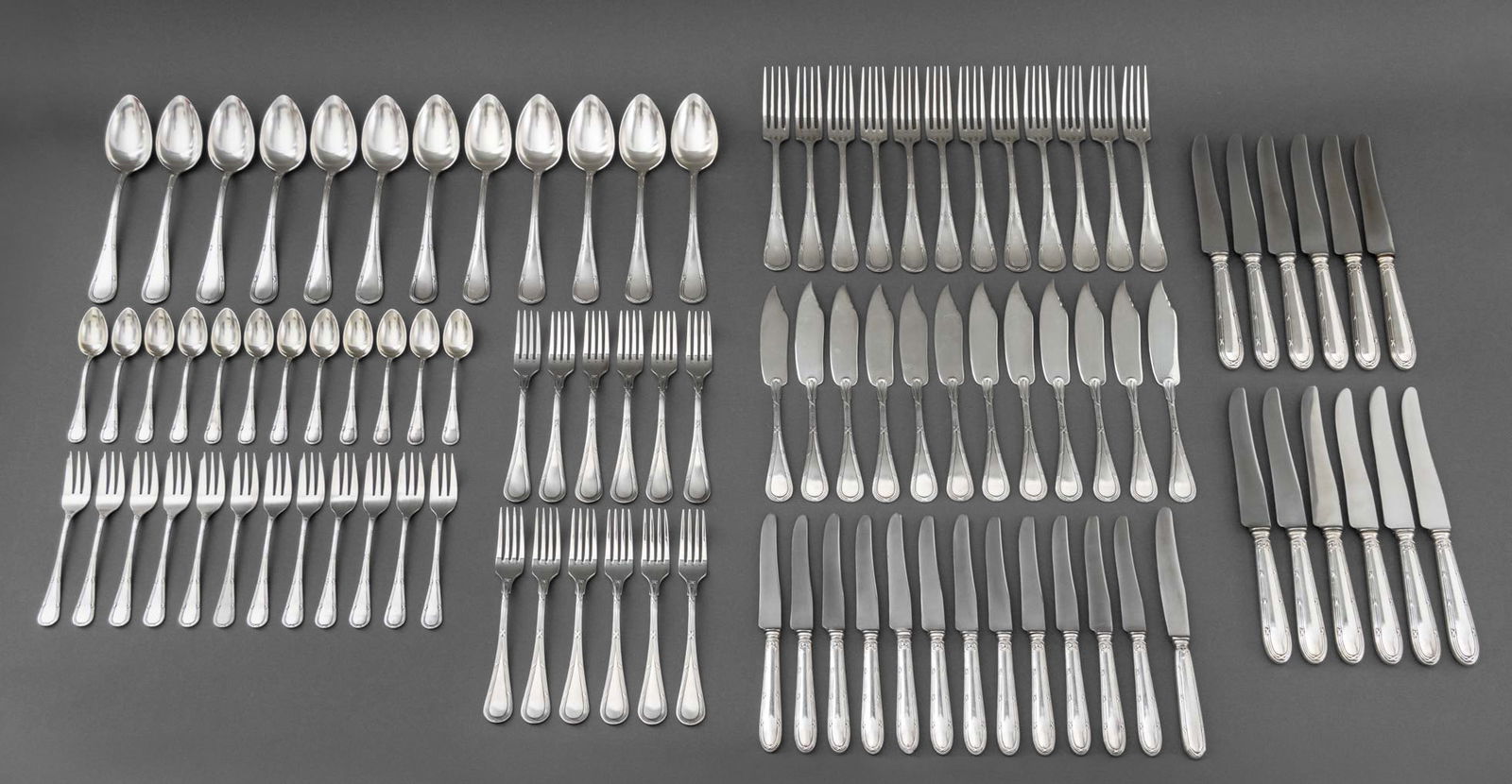 French Silver Plate "Rubans" Flatware Service x 12: French Silver Plate "Rubans" Pattern Flatware Service for 12, comprising: 12 teaspoons with maker's mark and "24" mark to reverse of handle, 12 dessert forks marked "Darmen / 24", 12 luncheon knives,