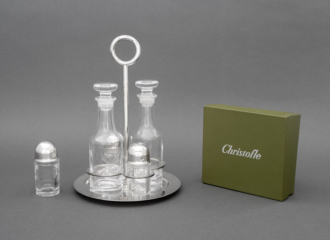 Christofle Silver Plate Tableware, 6 Pcs.: Group of Six Christofle Silver Plate Tableware Pieces, comprising: four piece cruet set, with (2) glass bottles and (2) shakers with glass bodies and silver plate lids, circular stand with ring