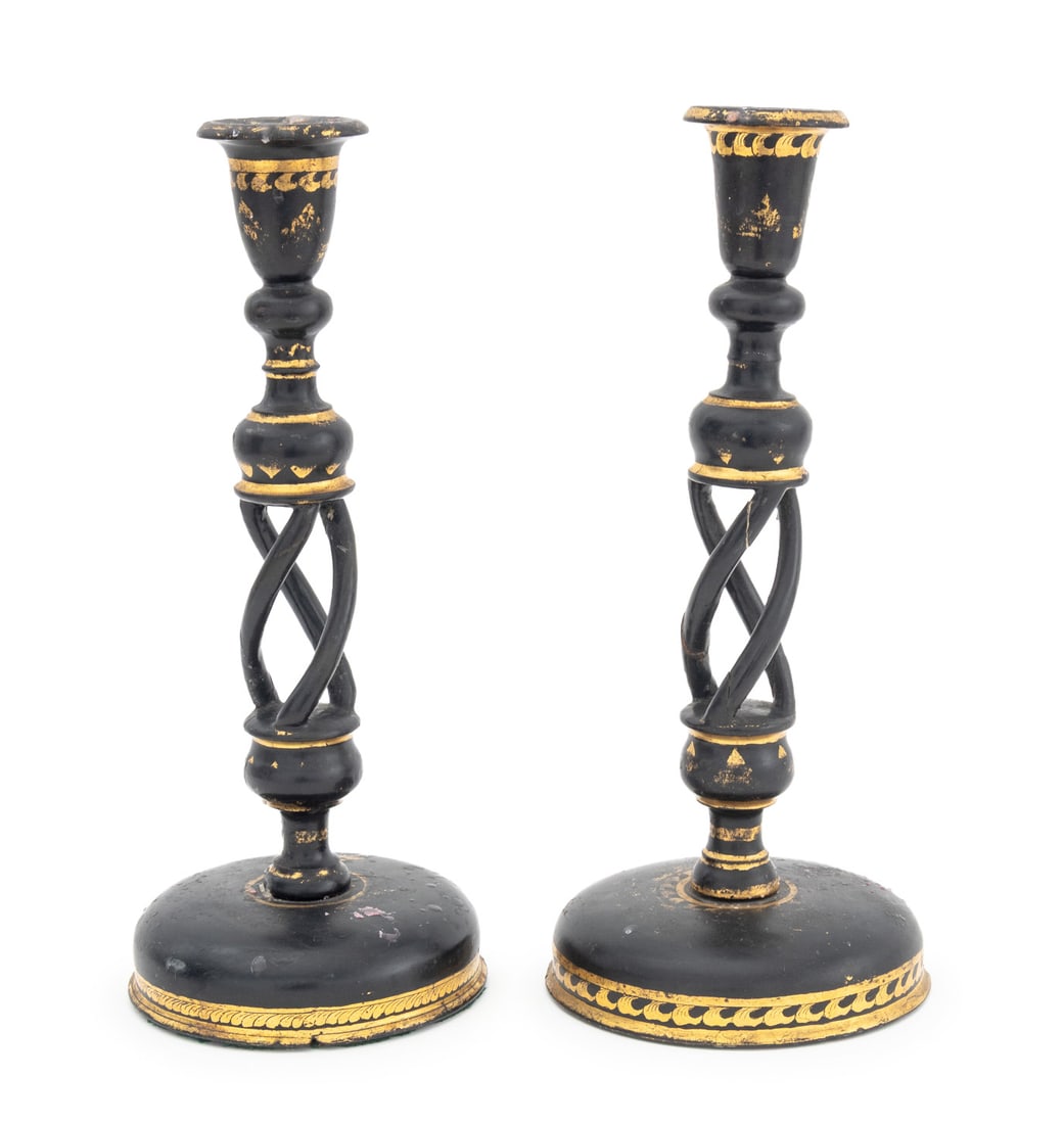 English Regency Ebonized & Gilt Candlesticks, Pair: Pair of English Regency Ebonized and Gilt Twist Form Candlesticks, with reticulated stems and geometric wave design on circular bases. 12.75" H x 5.25" Diameter. Provenance: From a Greenwich,