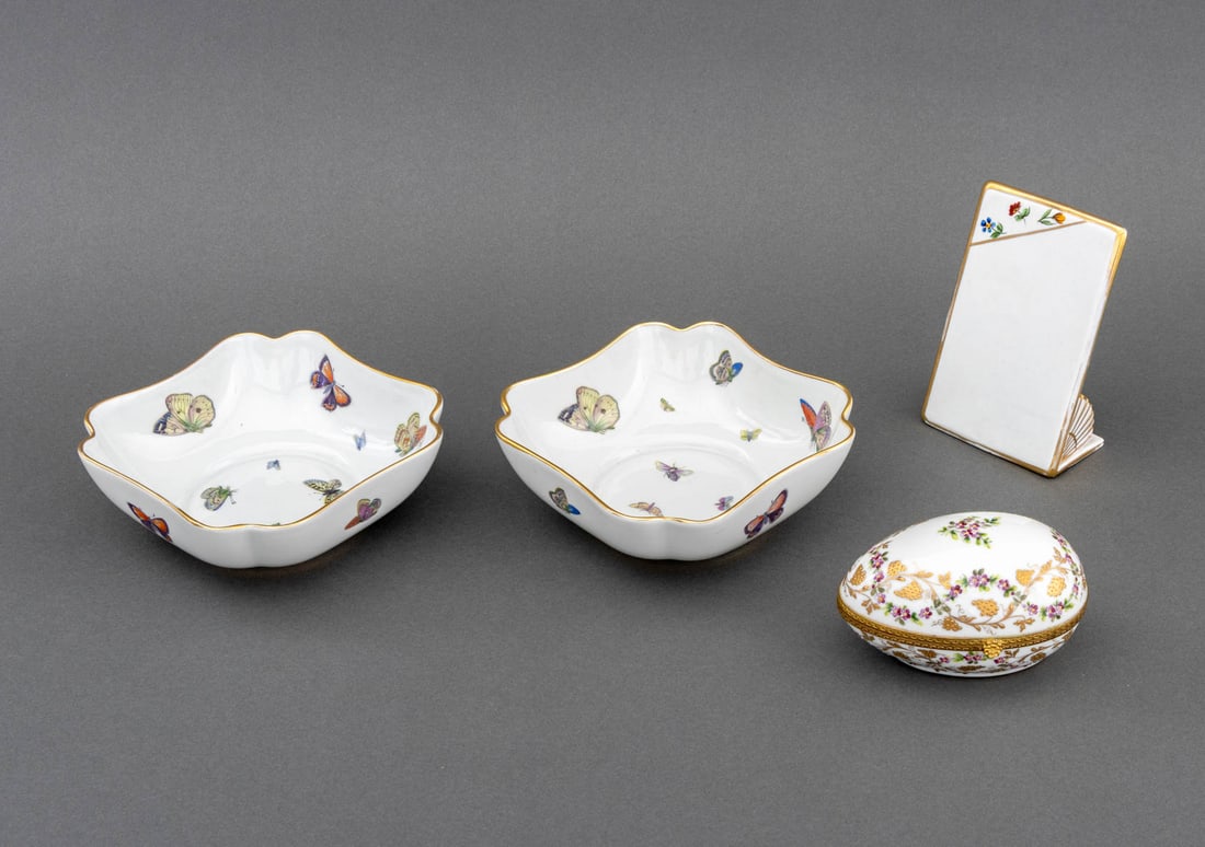Limoges Painted Porcelain Tableware, 4 Pcs.: Group of Four Limoges Painted Porcelain Tableware Pieces, comprising: pair of shaped bowls with butterfly pattern and gilt rim, marked "Limoges / France" to underside, egg form box with painted and gi